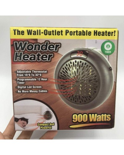 Портативный тепловентилятор мини электрообогреватель в розетку Wonder Heater 900W